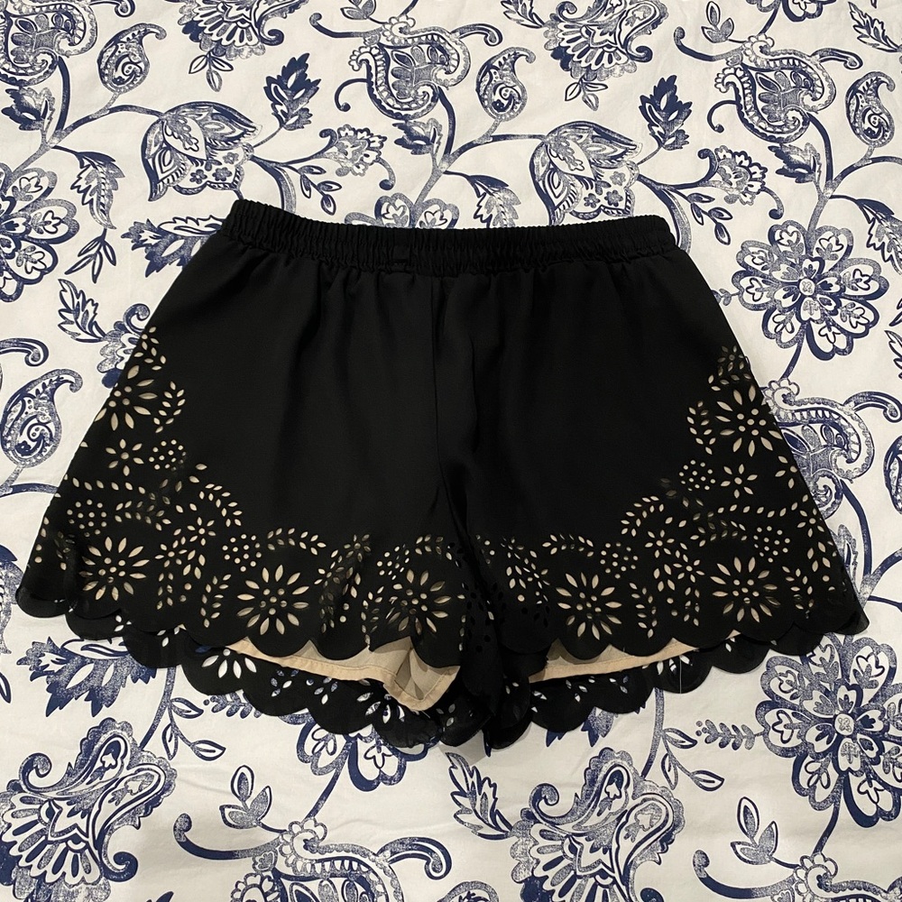 NWOT Shorts with stamped out design. Sz small